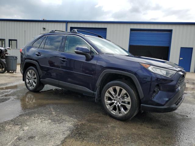 Photo 4 from auction – 2021 TOYOTA RAV4 XLE PREMIUM with VIN JTMC1RFV2MD063620
