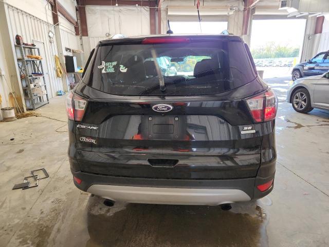 Foto 6 de la subasta – 2017 FORD ESCAPE SE con VIN 1FMCU0GD2HUD09446