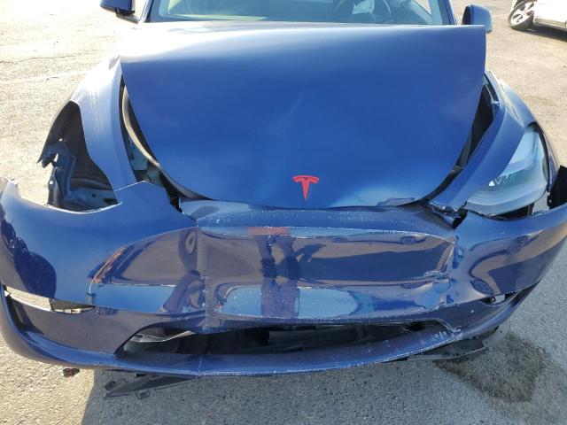 Photo 12 from auction – 2023 TESLA MODEL Y with VIN 7SAYGDEE5PF862316