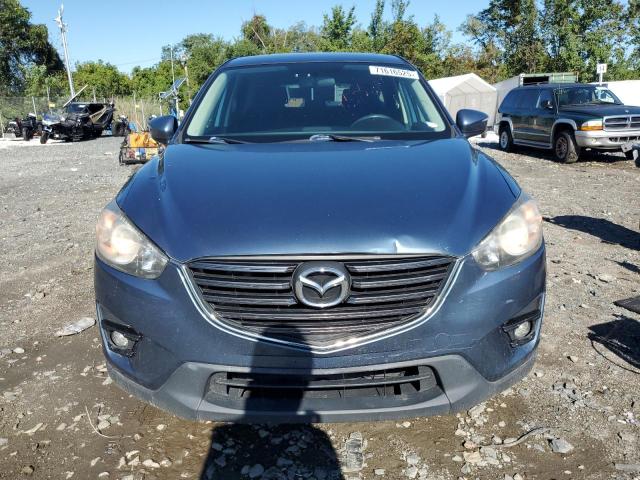 Photo 5 from auction – 2016 MAZDA CX-5 TOURI with VIN JM3KE2CY9G0743412