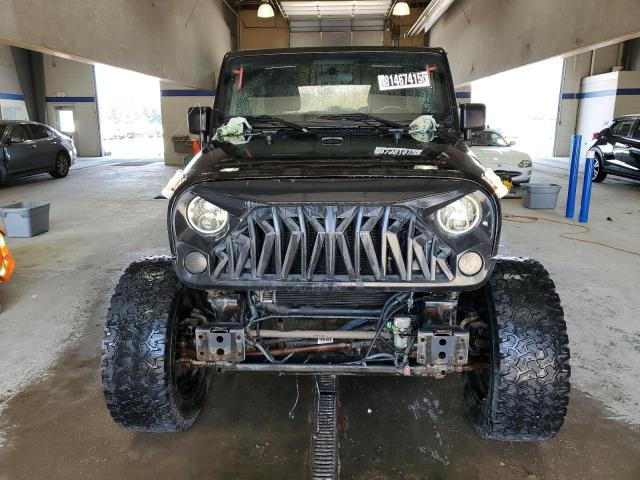 Photo 5 from auction – 2015 JEEP WRANGLER U with VIN 1C4BJWDG4FL746040