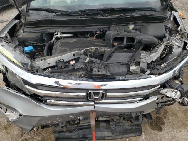 Photo 12 from auction – 2018 HONDA PILOT EXLN with VIN 5FNYF6H79JB053871