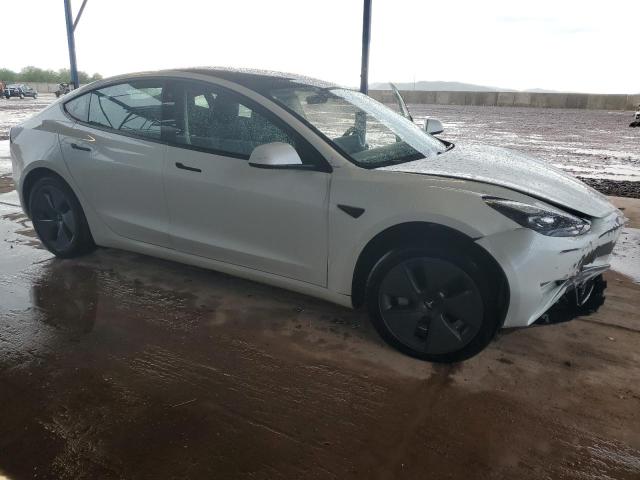Photo 4 from auction – 2023 TESLA MODEL 3 with VIN 5YJ3E1EBXPF703924
