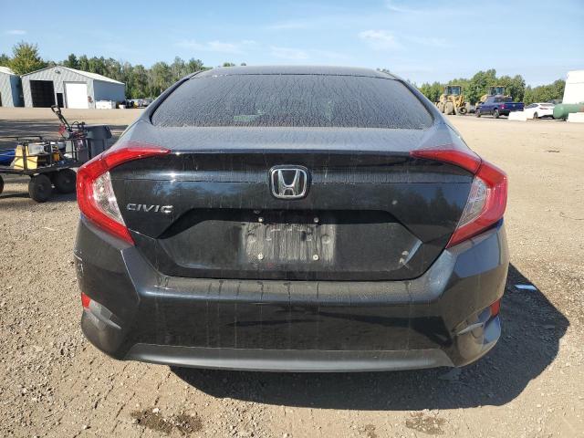 Photo 6 from auction – 2018 HONDA CIVIC LX with VIN 2HGFC2F52JH025223