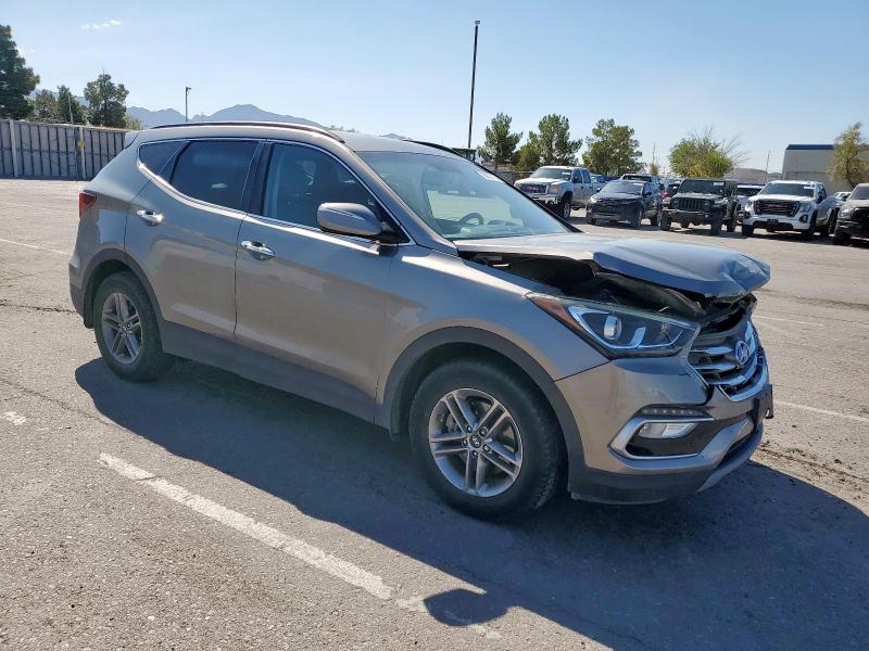 Photo 4 from auction – 2018 HYUNDAI SANTA FE S with VIN 5NMZU3LB2JH101312