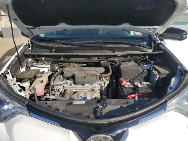 Photo 11 from auction – 2018 TOYOTA RAV4 LE with VIN 2T3BFREV0JW756568