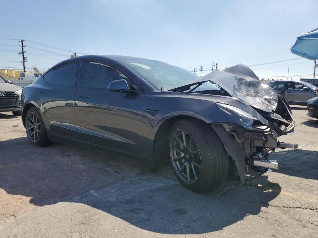 Photo 4 from auction – 2021 TESLA MODEL 3 with VIN 5YJ3E1EAXMF978003