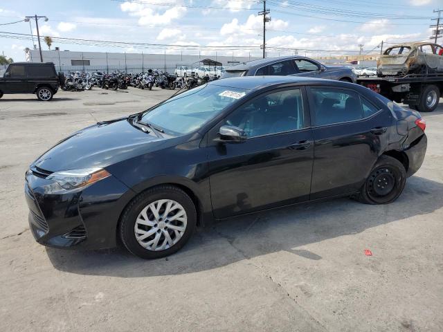 TOYOTA COROLLA L 2017 with VIN 5YFBURHE7HP697363 - Photo from auction