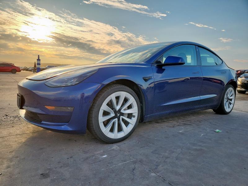 TESLA MODEL 3 2022 with VIN 5YJ3E1EAXNF144332 - Photo from auction