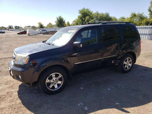 HONDA PILOT TOUR 2011 with VIN 5FNYF4H96BB506061 - Photo from auction