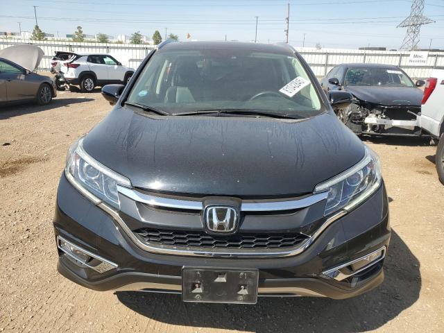 Photo 5 from auction – 2016 HONDA CR-V TOURING with VIN 5J6RM4H93GL101798