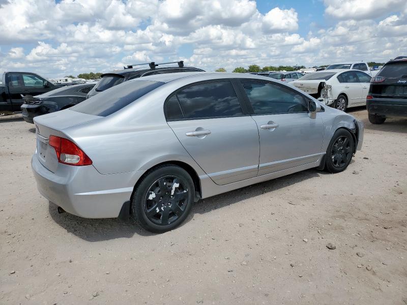 Photo 3 from auction – 2011 HONDA CIVIC LX with VIN 19XFA1F50BE037964