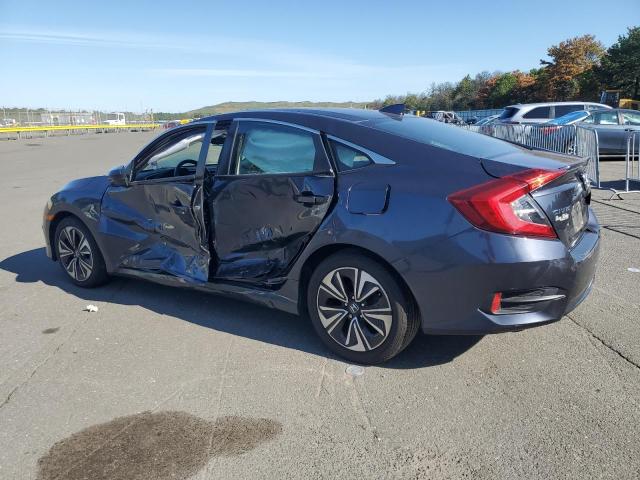 Photo 2 from auction – 2017 HONDA CIVIC EXL with VIN 2HGFC1F72HH655216