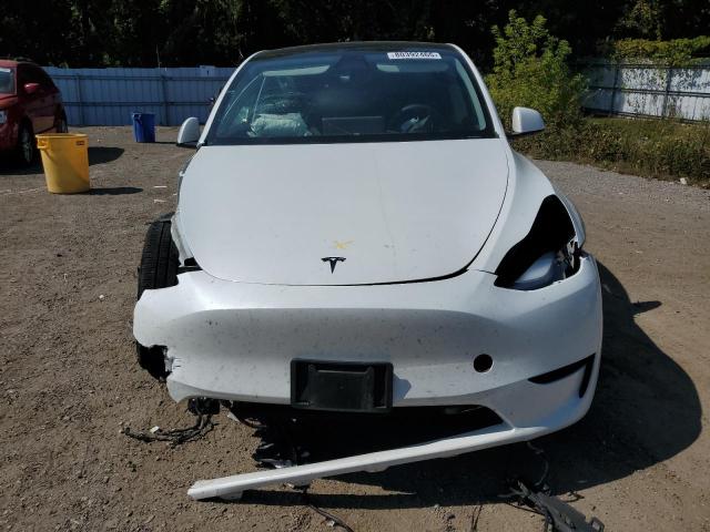Photo 5 from auction – 2023 TESLA MODEL Y with VIN LRWYGDEE5PC028568