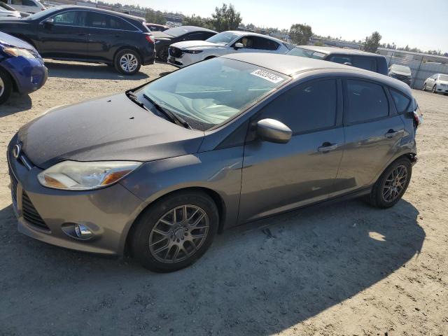 FORD FOCUS SE 2012 with VIN 1FAHP3K20CL338103 - Photo from auction