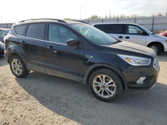 Photo 4 from auction – 2018 FORD ESCAPE SEL with VIN 1FMCU9HD7JUC41976
