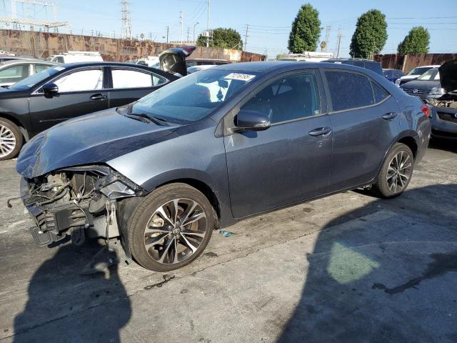 TOYOTA COROLLA L 2018 with VIN 2T1BURHEXJC021883 - Photo from auction