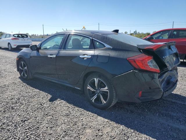 Photo 2 from auction – 2017 HONDA CIVIC TOUR with VIN 2HGFC1F90HH110620