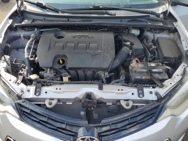 Photo 11 from auction – 2014 TOYOTA COROLLA L with VIN 2T1BURHE6EC007937
