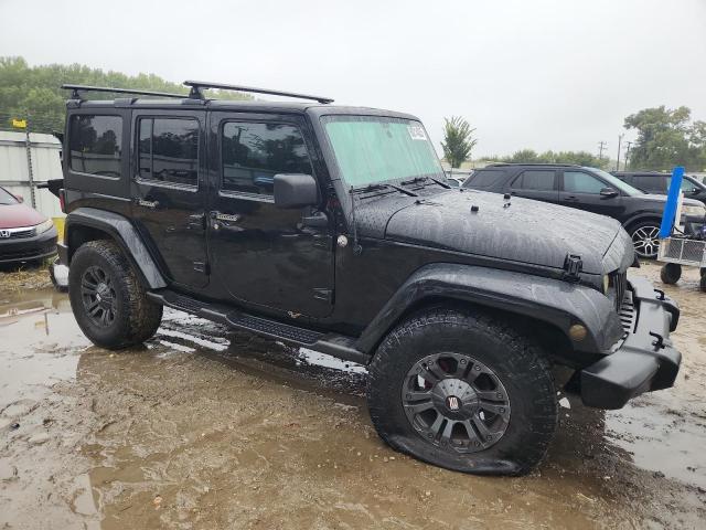 Photo 4 from auction – 2011 JEEP WRANGLER U with VIN 1J4HA5H10BL530149