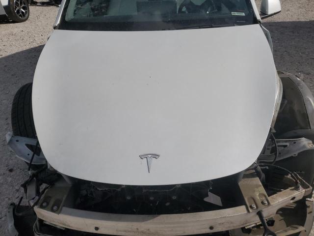 Photo 11 from auction – 2021 TESLA MODEL Y with VIN 5YJYGDEE6MF075299