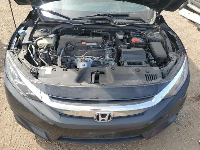 Photo 11 from auction – 2016 HONDA CIVIC LX with VIN 19XFC2F53GE034001