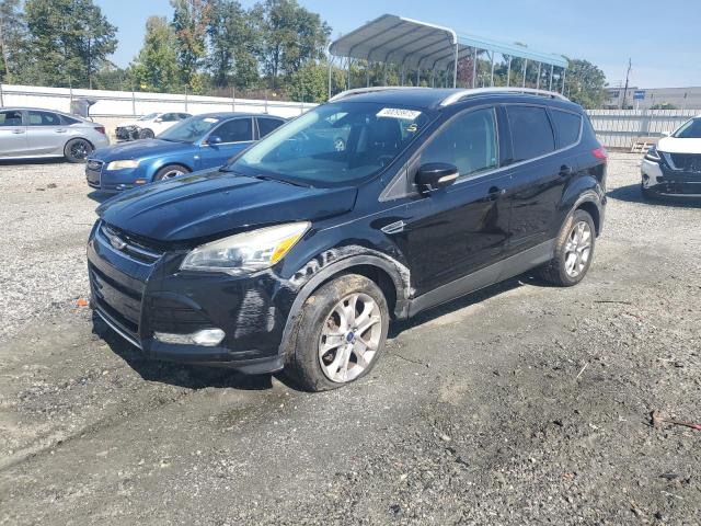 FORD ESCAPE TIT 2016 with VIN 1FMCU9JX6GUA64429 - Photo from auction
