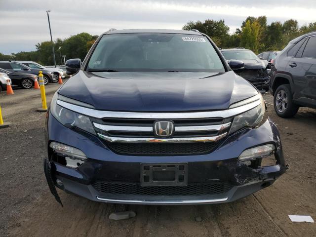Photo 5 from auction – 2018 HONDA PILOT TOUR with VIN 5FNYF6H96JB001776