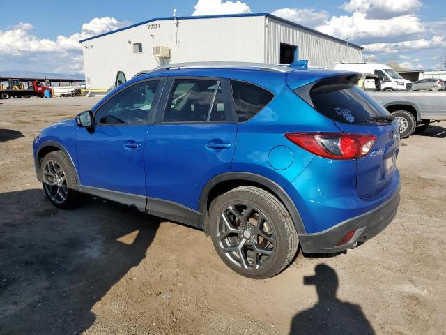 Photo 2 from auction – 2014 MAZDA CX-5 TOURI with VIN JM3KE2CY8E0306062
