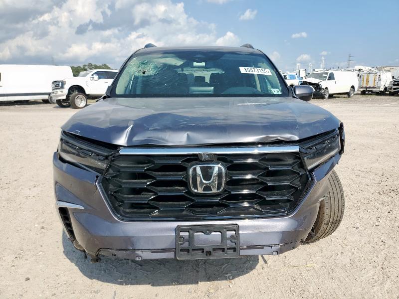 Photo 5 from auction – 2025 HONDA PILOT ELIT with VIN 5FNYG1H88SB029670