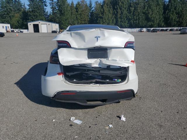 Photo 6 from auction – 2023 TESLA MODEL Y with VIN 7SAYGDEE4PF673608