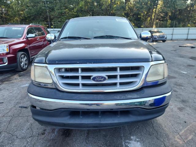 Photo 5 from auction – 1999 FORD F150 with VIN 2FTZX1723XCA76587