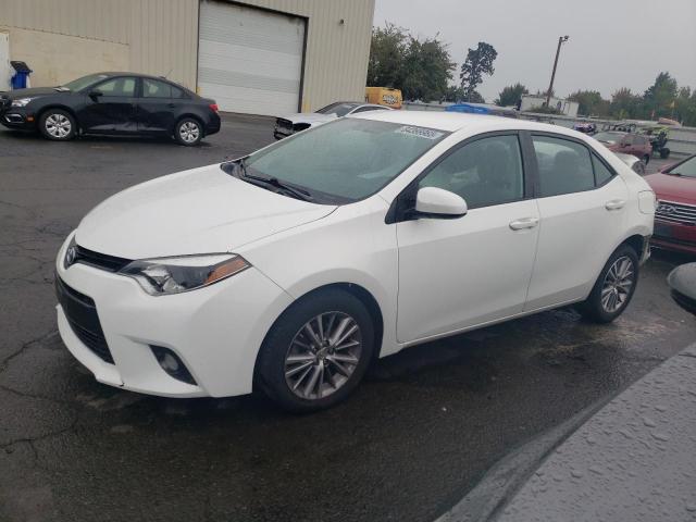 TOYOTA COROLLA L 2015 with VIN 5YFBURHE0FP193511 - Photo from auction