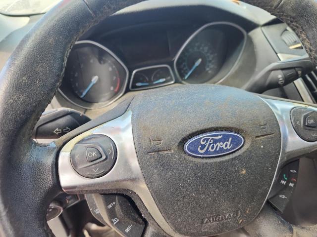Photo 9 from auction – 2012 FORD FOCUS with VIN 1FAHP3H25CL210611