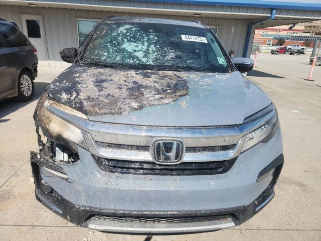 Photo 5 from auction – 2022 HONDA PILOT TOUR with VIN 5FNYF6H68NB077916