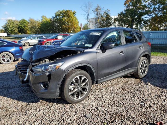 MAZDA CX-5 GT 2016 with VIN JM3KE4DYXG0728041 - Photo from auction
