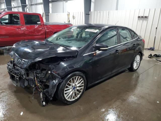 FORD FOCUS TITA 2014 with VIN 1FADP3J28EL169256 - Photo from auction