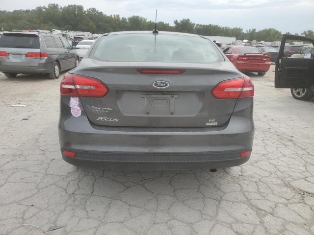 Foto 6 de la subasta – 2018 FORD FOCUS SE con VIN 1FADP3FE6JL240919