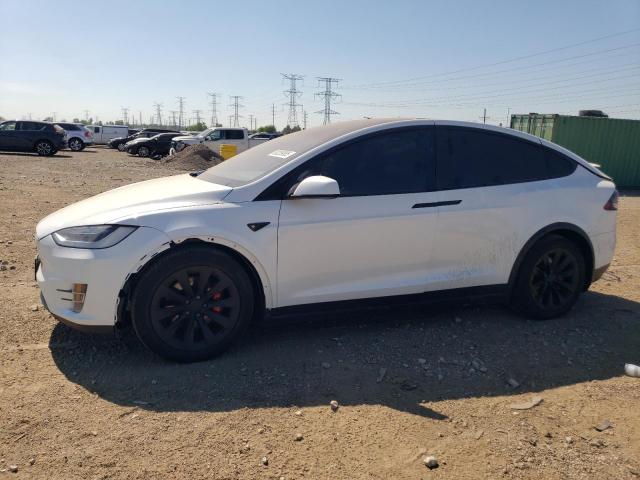 TESLA MODEL X 2018 with VIN 5YJXCDE27JF113132 - Photo from auction