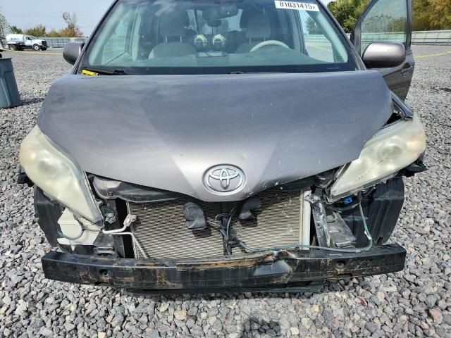 Photo 12 from auction – 2014 TOYOTA SIENNA LE with VIN 5TDKK3DC6ES438857
