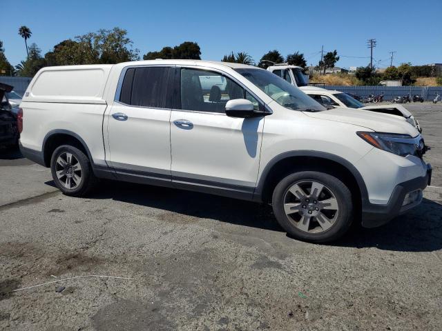 Photo 4 from auction – 2018 HONDA RIDGELINE RTL with VIN 5FPYK3F76JB009573