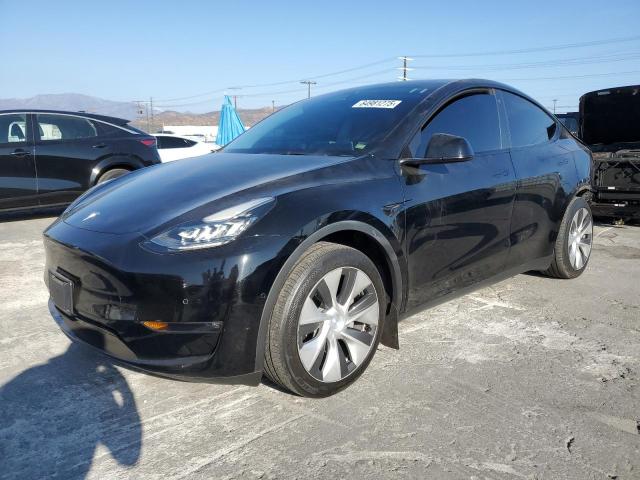 TESLA MODEL Y 2022 con VIN 7SAYGAEE0NF493974 - Foto de la subasta