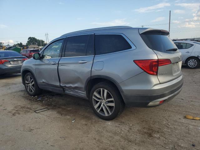 Photo 2 from auction – 2017 HONDA PILOT TOURING with VIN 5FNYF6H94HB047892