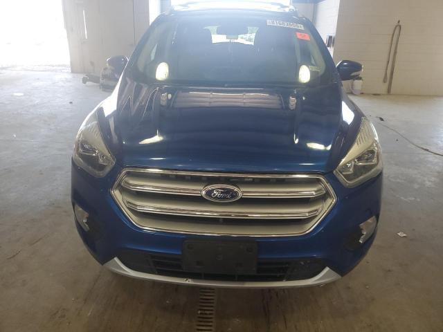 Photo 5 from auction – 2017 FORD ESCAPE TITANIUM with VIN 1FMCU0J90HUC30930