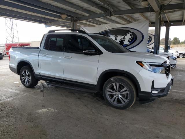 Photo 4 from auction – 2021 HONDA RIDGELINE with VIN 5FPYK3F89MB024744