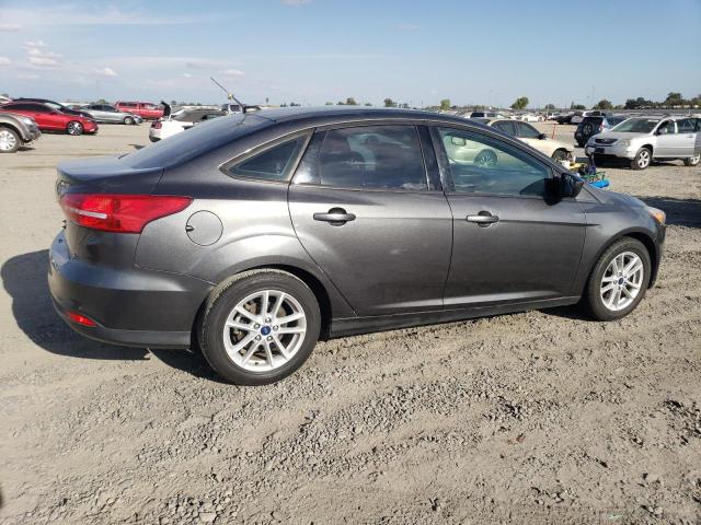 Foto 3 de la subasta – 2018 FORD FOCUS SE con VIN 1FADP3FE3JL223866