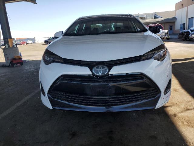 Photo 5 from auction – 2017 TOYOTA COROLLA L with VIN 5YFBURHE5HP569493