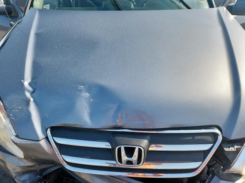 Photo 12 from auction – 2005 HONDA CR-V SE with VIN JHLRD78995C021428