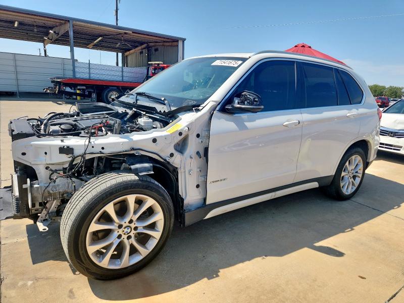 BMW X5 2014 con VIN 5UXKR0C57E0K49827 - Foto de la subasta