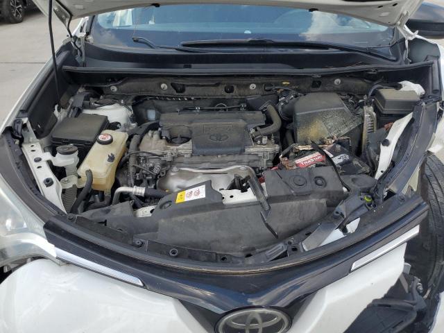 Photo 11 from auction – 2018 TOYOTA RAV4 LE with VIN JTMZFREV5JJ162099
